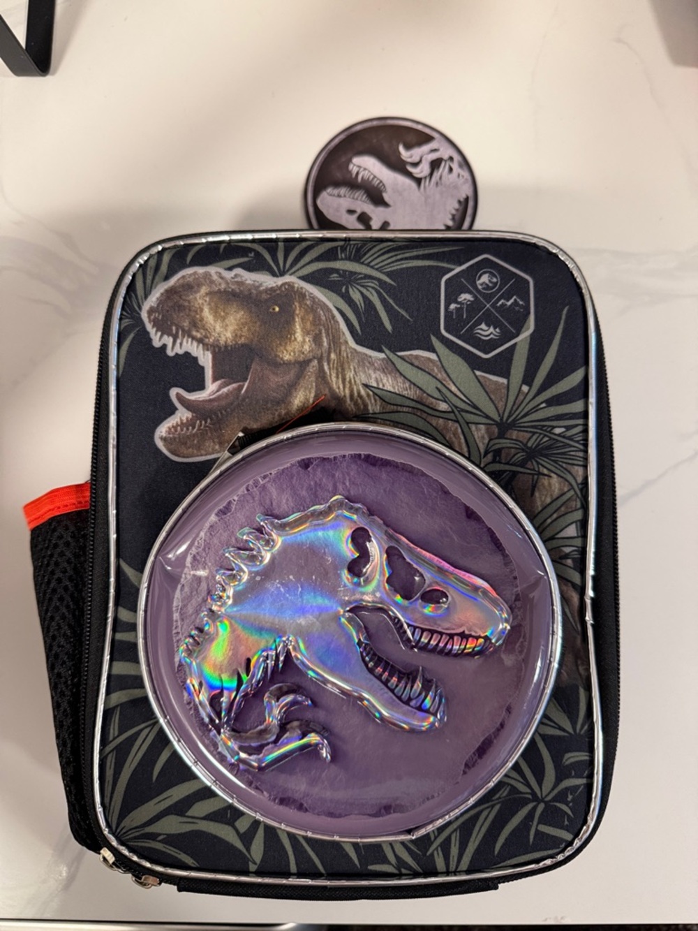 Kids Purple Dinosaur Lunch Bag with Holographic Skull Accent